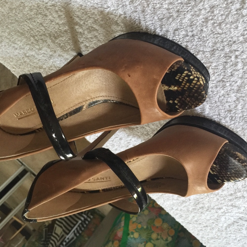 Tan and black platform shoe